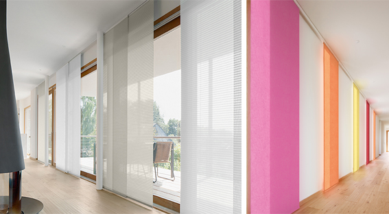 Große Fensterfronten mit weißen und bunten Flächenvorhängen